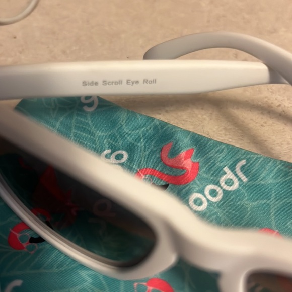 Goodr Side scroll eye roll white frames with a purple tint. Medium size frame - Picture 5 of 7